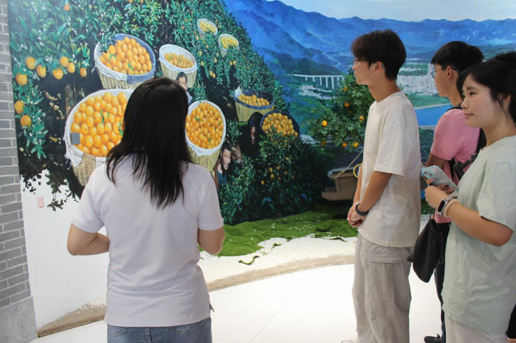 大学生探访柑橘产业航母：屈姑集团全产业链实践课揭秘秭归脐橙的全球之旅