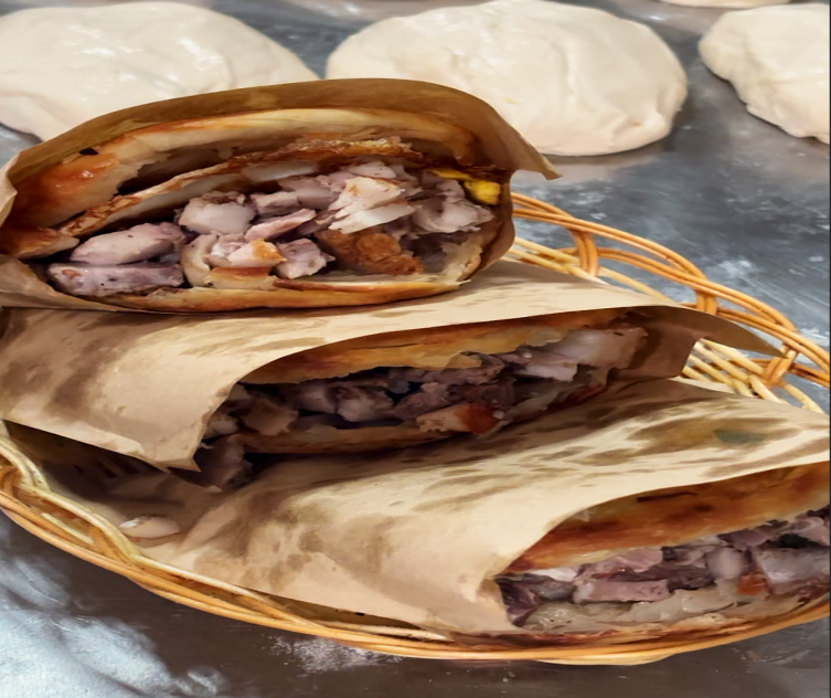 弭记回村火烧：一面千层的乡土匠心传承